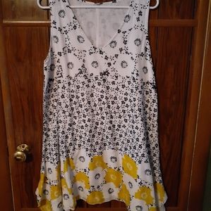 White dress with black and yellow floral